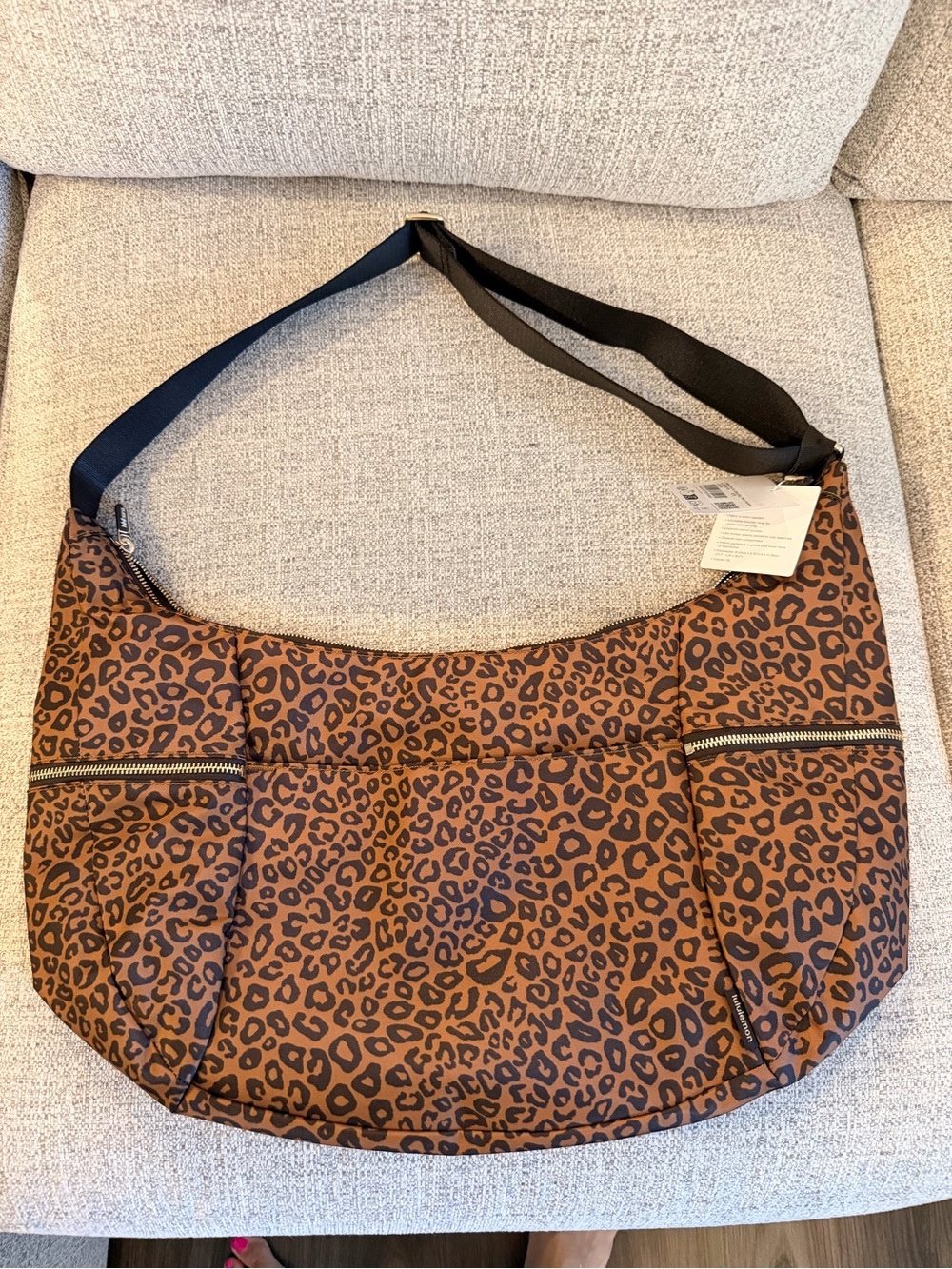 Lululemon Large Slouchy Sling Bag 13L
Metal Hardware leopard print NWT - Picture 12 of 14